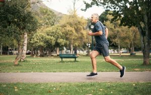 man using testosterone replacement therapy for health management running