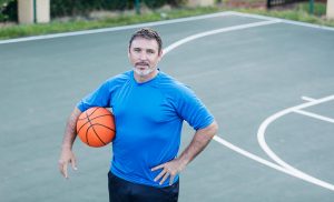 Man playing basketball who has prediabetes and is taking testosterone replacement