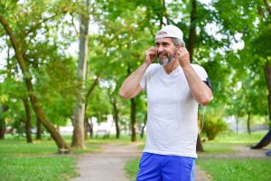 man with renewed strength and energy after visiting men's health clinic