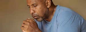 man feeling anxious and depressed and needing men's health management