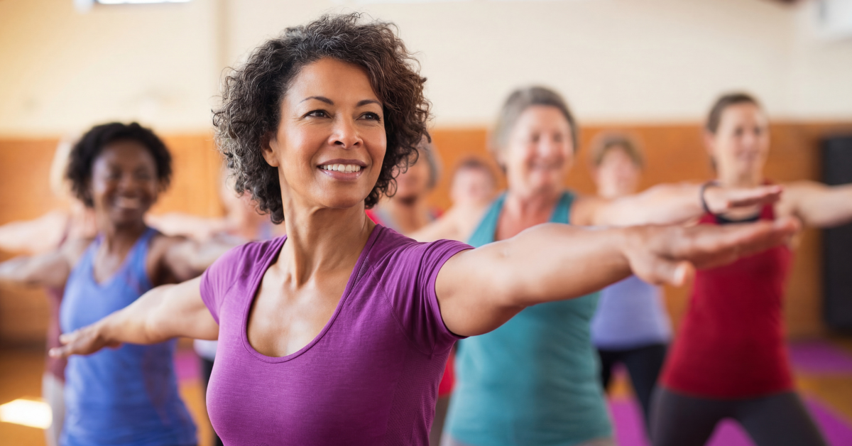 Woman with arms outstretched enjoying her garden — injectable hormone therapy for women
