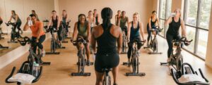 Group of women in a cycling class.